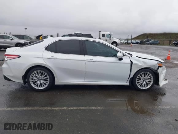 ✅ 2018 Toyota Camry Hybrid SE • VIN: 4T1B21HK0JU005414 • Lot: 43715775. Listed on IAAI with 176,737 mi. Free auction sales archive from the USA and detailed vehicle history report at DreamBid. Image 14.
