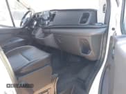 ✅ 2023 Ford Transit Cargo • VIN: 1FTBR1X84PKB02027 • Lot: 42062820. Listed on IAAI with 79,813 mi. Free auction sales archive from the USA and detailed vehicle history report at DreamBid. Image 5.