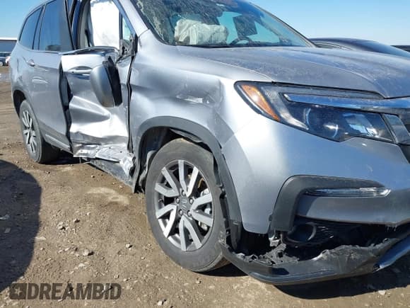 ✅ 2022 Honda Pilot EX-L • VIN: 5FNYF6H54NB018613 • Lot: 41566973. Listed on IAAI with 56,173 mi. Free auction sales archive from the USA and detailed vehicle history report at DreamBid. Image 6.