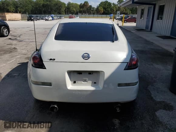 ✅ 2003 Nissan 350Z • VIN: JN1AZ34D93T101309 • Лот: 66634585. Опубликован ранее на Copart с пробегом 108 754 миль. Бесплатный доступ к архиву аукционных продаж из США и подробный отчёт об истории автомобиля на DreamBid. Изображение 6.