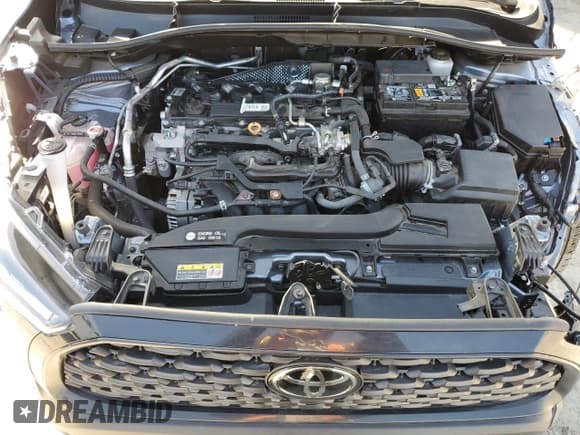 ✅ 2023 Toyota Corolla Cross LE • VIN: 7MUBAABG8PV045934 • Lot: 52174075. Wystawiony na Copart z przebiegiem 11 378 mil. Bezpłatny archiwum sprzedaży aukcyjnych z USA i szczegółowy raport historii pojazdu na DreamBid. Zdjęcie 12.