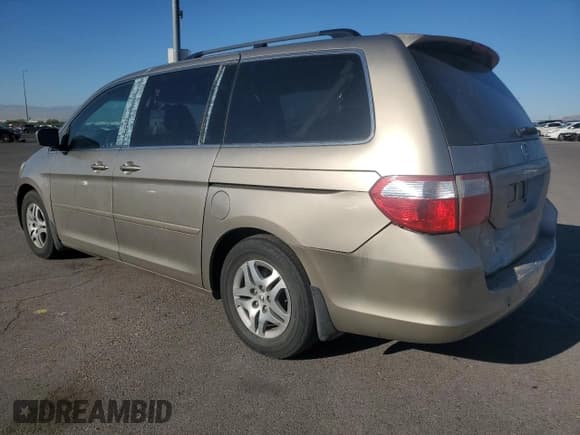 ✅ 2005 Honda Odyssey EX-L • VIN: 5FNRL38705B097212 • Лот: 92655085. Опубликован ранее на Copart с пробегом 162 776 миль. Бесплатный доступ к архиву аукционных продаж из США и подробный отчёт об истории автомобиля на DreamBid. Изображение 2.