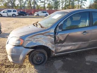 ✅ 2011 Chevrolet Aveo 1LT • VIN: KL1TD5DE1BB233498 • Lot: 40847879. Wystawiony na IAAI z przebiegiem Nie podano. Bezpłatny archiwum sprzedaży aukcyjnych z USA i szczegółowy raport historii pojazdu na DreamBid. Zdjęcie 6.