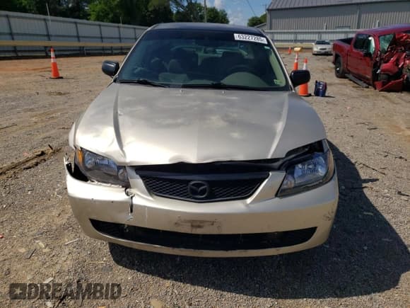 ✅ 2003 Mazda Protege DX • VIN: JM1BJ226730103729 • Lot: 63227285. Listed on Copart with 185,866 mi. Free auction sales archive from the USA and detailed vehicle history report at DreamBid. Image 5.