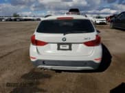 ✅ 2013 BMW X1 28i • VIN: WBAVM1C54DVL64127 • Лот: 92442935. Опубликован ранее на Copart с пробегом Не указан. Бесплатный доступ к архиву аукционных продаж из США и подробный отчёт об истории автомобиля на DreamBid. Изображение 6.
