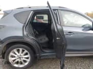 ✅ 2013 Mazda CX-5 Grand Touring • VIN: JM3KE4DE9D0129147 • Лот: 43575564. Опубликован ранее на IAAI с пробегом 106 955 миль. Бесплатный доступ к архиву аукционных продаж из США и подробный отчёт об истории автомобиля на DreamBid. Изображение 8.