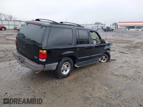 ✅ 1997 Ford Explorer XLT • VIN: 1FMDU32P8VZC18431 • Lot: 41432929. Listed on IAAI with 185,389 mi. Free auction sales archive from the USA and detailed vehicle history report at DreamBid. Image 4.