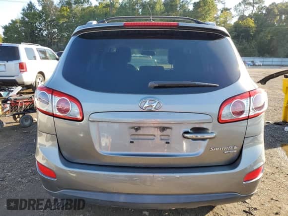 2011 Hyundai Santa Fe Limited z VIN 5XYZK4AG4BG049509, wystawiony jako Copart lot #91766415 z przebiegiem 137 722 mil mil oraz Czysty tytuł • Clean title. Historia ofert i sprzedaży dostępna na DreamBid. Obrazek 6.