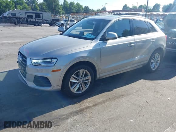 ✅ 2017 Audi Q3 Premium Plus • VIN: WA1JCCFS0HR002418 • Lot: 42551705. Listed on IAAI with 98,496 mi. Free auction sales archive from the USA and detailed vehicle history report at DreamBid. Image 17.
