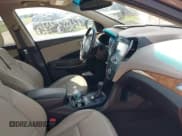 ✅ 2014 Hyundai Santa Fe • VIN: 5XYZUDLB1EG227778 • Lot: 43033757. Listed on IAAI with 135,496 mi. Free auction sales archive from the USA and detailed vehicle history report at DreamBid. Image 5.