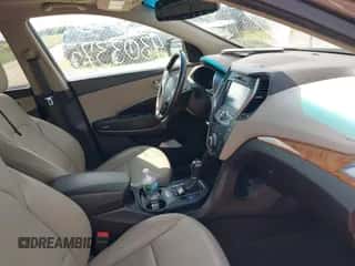 2014 Hyundai Santa Fe with VIN 5XYZUDLB1EG227778, listed as a IAAI auction lot 43033757 with 135,496 mi miles and . Bid and sale history available at DreamBid. Image 5.