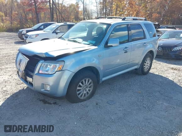 2009 Mercury Mariner Premier with VIN 4M2CU97739KJ14224, listed as a IAAI auction lot 43552437 with 103,277 mi miles and . Bid and sale history available at DreamBid. Image 17.