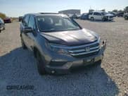 ✅ 2018 Honda Pilot EX-L • VIN: 5FNYF5H6XJB008231 • Lot: 70389974. Listed on Copart with Not provided. Free auction sales archive from the USA and detailed vehicle history report at DreamBid. Image 12.