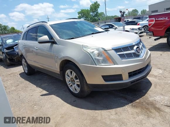 ✅ 2012 Cadillac SRX • VIN: 3GYFNGE37CS630953 • Lot: 42509427. Listed on IAAI with 123,545 mi. Free auction sales archive from the USA and detailed vehicle history report at DreamBid. Image 1.