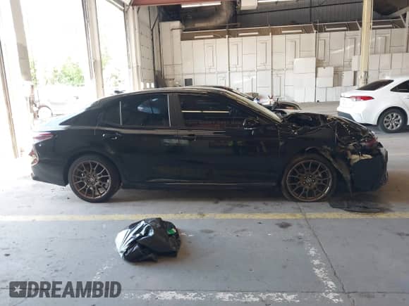 2023 Toyota Camry SE with VIN 4T1G11BK4PU088615, listed as a IAAI auction lot 42345340 with 35,468 mi miles and . Bid and sale history available at DreamBid. Image 13.