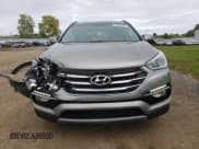 ✅ 2018 Hyundai Santa Fe Limited • VIN: 5XYZUDLA4JG549784 • Лот: 70005283. Опубликован ранее на Copart с пробегом 47 686 миль. Бесплатный доступ к архиву аукционных продаж из США и подробный отчёт об истории автомобиля на DreamBid. Изображение 5.