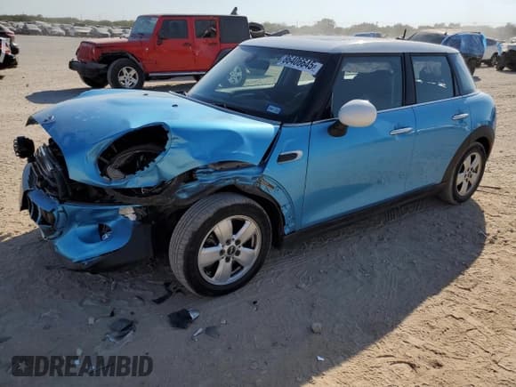✅ 2018 MINI Hardtop 4 Door Cooper • VIN: WMWXU1C51J2F79229 • Lot: 86406645. Listed on Copart with 36,986 mi. Free auction sales archive from the USA and detailed vehicle history report at DreamBid. Image 1.