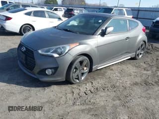 ✅ 2014 Hyundai Veloster Turbo • VIN: KMHTC6AE3EU196500 • Lot: 41586949. Listed on IAAI with 132,911 mi. Free auction sales archive from the USA and detailed vehicle history report at DreamBid. Image 2.