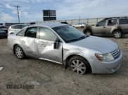 ✅ 2009 Ford Taurus SE • VIN: 1FAHP23W09G109353 • Lot: 91794145. Listed on Copart with 99,976 mi. Free auction sales archive from the USA and detailed vehicle history report at DreamBid. Image 4.