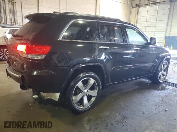 ✅ 2015 Jeep Grand Cherokee Overland • VIN: 1C4RJFCG8FC732562 • Lot: 46518865. Listed on Copart with 70,875 mi. Free auction sales archive from the USA and detailed vehicle history report at DreamBid. Image 3.