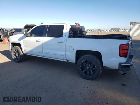 2017 Chevrolet Silverado 1500 LT with VIN 3GCUKREC0HG346639, listed as a Copart auction lot 84704735 with 155,893 mi miles and Salvage title. Bid and sale history available at DreamBid. Image 2.