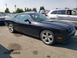 ✅ 2014 Dodge Challenger SXT • VIN: 2C3CDYAG4EH258427 • Lot: 81430765. Wystawiony na Copart z przebiegiem Nie podano. Bezpłatny archiwum sprzedaży aukcyjnych z USA i szczegółowy raport historii pojazdu na DreamBid. Zdjęcie 4.