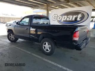 ✅ 1999 Dodge Dakota Sport • VIN: 1B7FL26PXXS242942 • Lot: 57000815. Wystawiony na Copart z przebiegiem 119 633 mil. Bezpłatny archiwum sprzedaży aukcyjnych z USA i szczegółowy raport historii pojazdu na DreamBid. Zdjęcie 2.