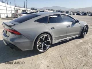 ✅ 2024 Audi RS 7 performance • VIN: WUAPDBF24RN903018 • Lot: 77686704. Listed on Copart with 4,155 mi. Free auction sales archive from the USA and detailed vehicle history report at DreamBid. Image 3.