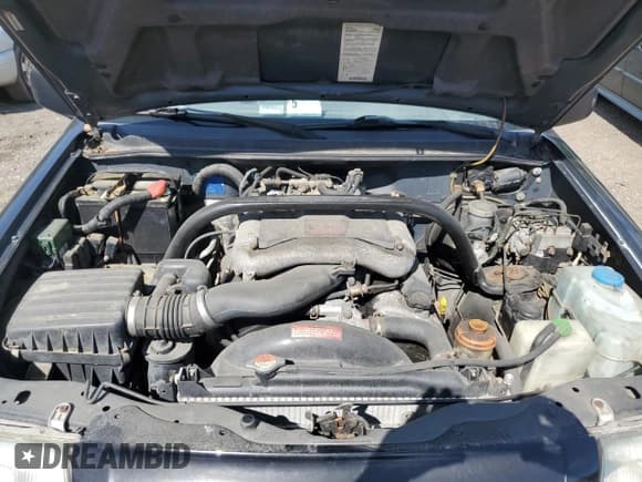 ✅ 1999 Suzuki Grand Vitara JLX • VIN: JS3TD62VXX4100236 • Лот: 57228075. Опубликован ранее на Copart с пробегом Не указан. Бесплатный доступ к архиву аукционных продаж из США и подробный отчёт об истории автомобиля на DreamBid. Изображение 12.