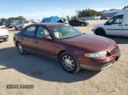 ✅ 2000 Buick Regal GS • VIN: 2G4WF5514Y1306394 • Lot: 82604365. Listed on Copart with 75,373 mi. Free auction sales archive from the USA and detailed vehicle history report at DreamBid. Image 4.