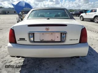 ✅ 2003 Cadillac DeVille • VIN: 1G6KD54YX3U272744 • Lot: 72781034. Listed on Copart with 163,533 mi. Free auction sales archive from the USA and detailed vehicle history report at DreamBid. Image 6.