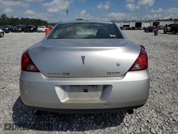 ✅ 2007 Pontiac G6 GTP • VIN: 1G2ZM177274237228 • Lot: 51660725. Wystawiony na Copart z przebiegiem 218 227 mil. Bezpłatny archiwum sprzedaży aukcyjnych z USA i szczegółowy raport historii pojazdu na DreamBid. Zdjęcie 6.