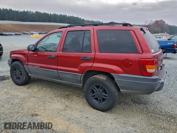 ✅ 2002 Jeep Grand Cherokee Laredo • VIN: 1J4GW48N72C107241 • Lot: 94089295. Wystawiony na Copart z przebiegiem 286 835 mil. Bezpłatny archiwum sprzedaży aukcyjnych z USA i szczegółowy raport historii pojazdu na DreamBid. Zdjęcie 2.