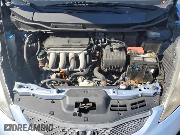 ✅ 2009 Honda Fit • VIN: JHMGE88279S056618 • Lot: 85530525. Listed on Copart with 117,815 mi. Free auction sales archive from the USA and detailed vehicle history report at DreamBid. Image 11.