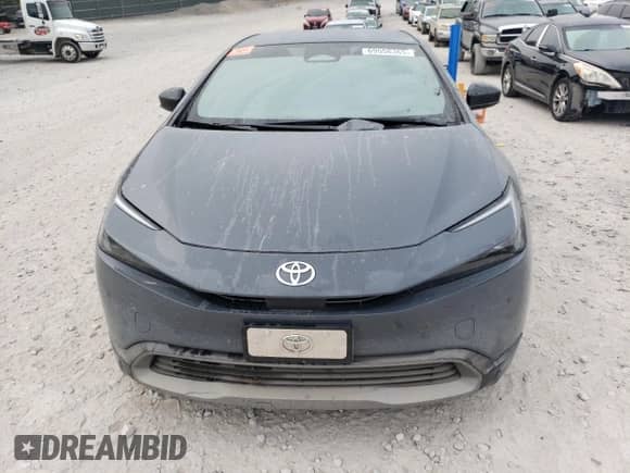 2023 Toyota Prius LE с VIN JTDACAAU9P3003815, выставлен на аукционе Copart как лот 69556365 с пробегом 60 912 миль миль и Списание • Salvage title. История ставок и продаж доступна на DreamBid. Изображение 5.