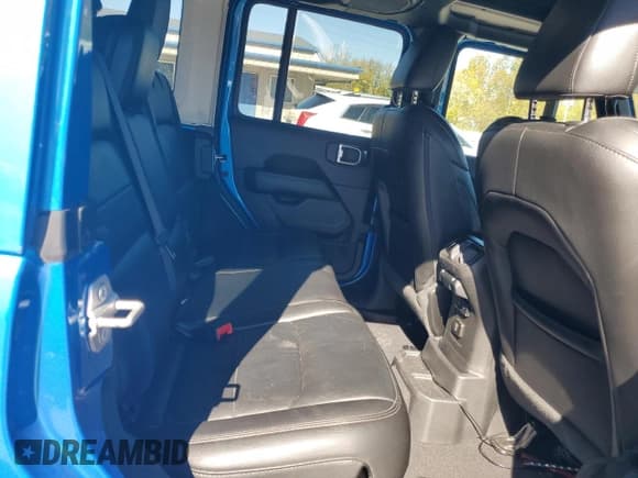 ✅ 2022 Jeep Wrangler Unlimited Sahara Altitude • VIN: 1C4HJXEGXNW105521 • Lot: 87063465. Listed on Copart with 86,243 mi. Free auction sales archive from the USA and detailed vehicle history report at DreamBid. Image 11.