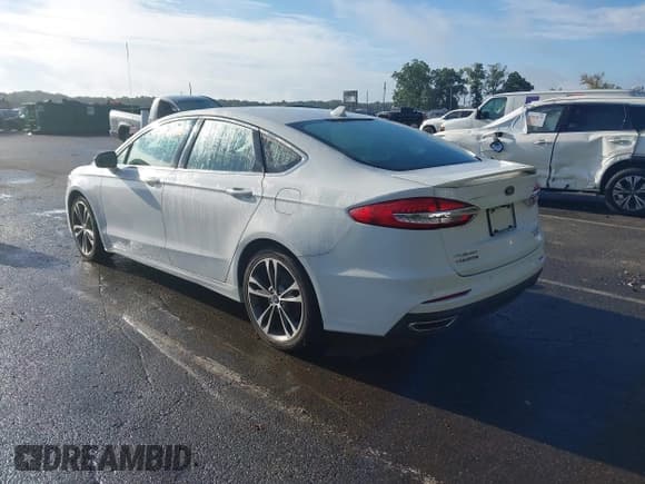 ✅ 2020 Ford Fusion Titanium • VIN: 3FA6P0D90LR192349 • Лот: 43286385. Опубликован ранее на IAAI с пробегом 81 314 миль. Бесплатный доступ к архиву аукционных продаж из США и подробный отчёт об истории автомобиля на DreamBid. Изображение 3.