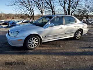 2002 Hyundai Sonata GLS with VIN KMHWF35H52A626032, listed as a Copart auction lot 86873644 with 169,614 mi miles and Salvage title. Bid and sale history available at DreamBid. Image 1.