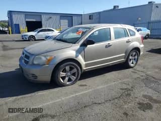 2010 Dodge Caliber SXT with VIN 1B3CB4HA5AD618955, listed as a Copart auction lot 81330035 with Not provided miles and Salvage title. Bid and sale history available at DreamBid. Image 1.