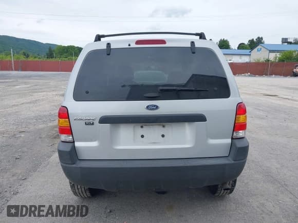 ✅ 2003 Ford Escape XLT Popular 2 • VIN: 1FMYU93193KC76018 • Lot: 42355904. Listed on IAAI with 233,131 mi. Free auction sales archive from the USA and detailed vehicle history report at DreamBid. Image 16.