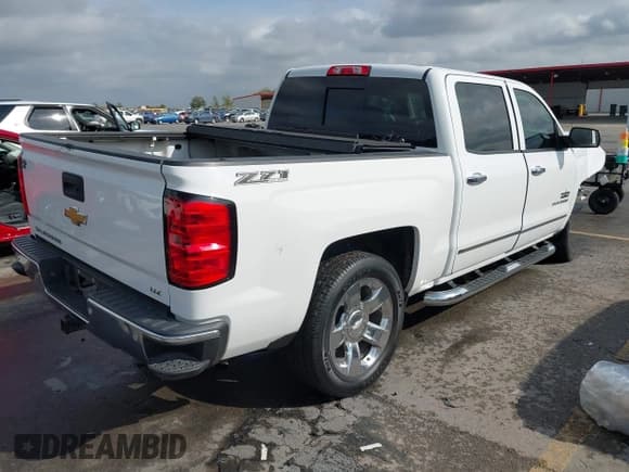 ✅ 2014 Chevrolet Silverado 1500 LTZ • VIN: 3GCPCSEC1EG111406 • Лот: 43502858. Опубликован ранее на IAAI с пробегом 249 070 миль. Бесплатный доступ к архиву аукционных продаж из США и подробный отчёт об истории автомобиля на DreamBid. Изображение 4.