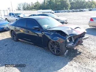 ✅ 2019 Dodge Charger GT • VIN: 2C3CDXHG6KH607440 • Lot: 43339359. Listed on IAAI with 144,137 mi. Free auction sales archive from the USA and detailed vehicle history report at DreamBid. Image 1.