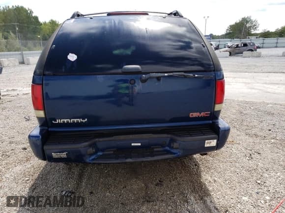 ✅ 2000 GMC Jimmy SLS • VIN: 1GKCS18WXYK260836 • Lot: 70467745. Wystawiony na Copart z przebiegiem 206 513 mil. Bezpłatny archiwum sprzedaży aukcyjnych z USA i szczegółowy raport historii pojazdu na DreamBid. Zdjęcie 6.