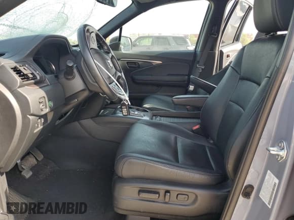 ✅ 2022 Honda Passport EX-L • VIN: 5FNYF8H52NB031405 • Lot: 57150355. Listed on Copart with 55,152 mi. Free auction sales archive from the USA and detailed vehicle history report at DreamBid. Image 7.
