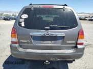 ✅ 2003 Mazda Tribute ES • VIN: 4F2CZ06113KM34892 • Lot: 66942765. Listed on Copart with 240,643 mi. Free auction sales archive from the USA and detailed vehicle history report at DreamBid. Image 6.