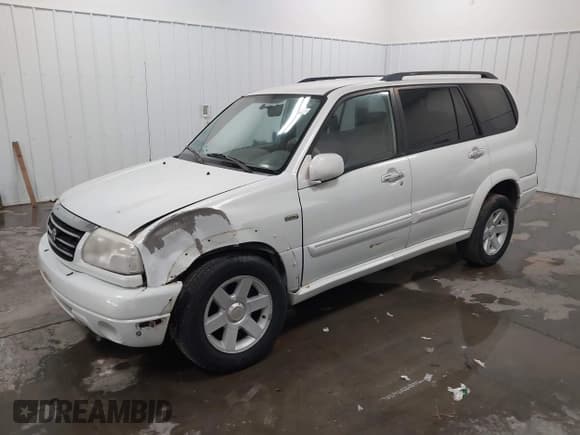✅ 2003 Suzuki XL7 Touring • VIN: JS3TX92V034107196 • Lot: 43475119. Wystawiony na IAAI z przebiegiem 96 987 mil. Bezpłatny archiwum sprzedaży aukcyjnych z USA i szczegółowy raport historii pojazdu na DreamBid. Zdjęcie 2.
