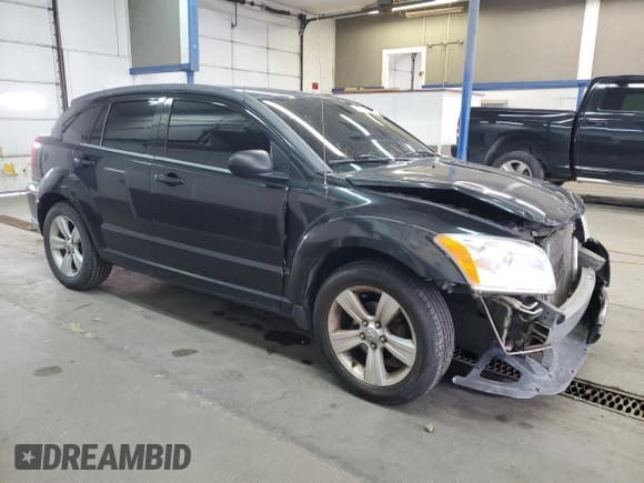 ✅ 2010 Dodge Caliber SXT • VIN: 1B3CB4HA5AD552617 • Лот: 82709404. Опубликован ранее на Copart с пробегом 136 349 миль. Бесплатный доступ к архиву аукционных продаж из США и подробный отчёт об истории автомобиля на DreamBid. Изображение 4.