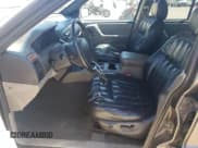 ✅ 1999 Jeep Grand Cherokee Laredo • VIN: 1J4G258S6XC606420 • Лот: 49896105. Опубликован ранее на Copart с пробегом 170 904 миль. Бесплатный доступ к архиву аукционных продаж из США и подробный отчёт об истории автомобиля на DreamBid. Изображение 7.