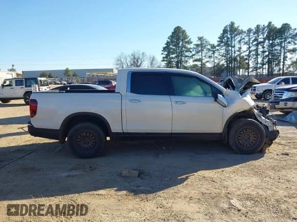 ✅ 2018 Honda Ridgeline RTL-E • VIN: 5FPYK3F71JB016317 • Lot: 41388515. Listed on IAAI with Not provided. Free auction sales archive from the USA and detailed vehicle history report at DreamBid. Image 14.
