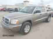 2006 Dodge Dakota SLT with VIN 1D7HE48N16S703072, listed as a IAAI auction lot 42156709 with 102,919 mi miles and . Bid and sale history available at DreamBid. Image 2.